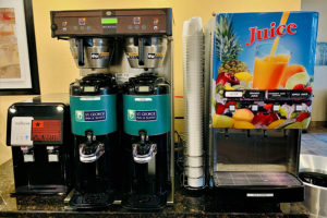breakfast area with coffee and juice stations