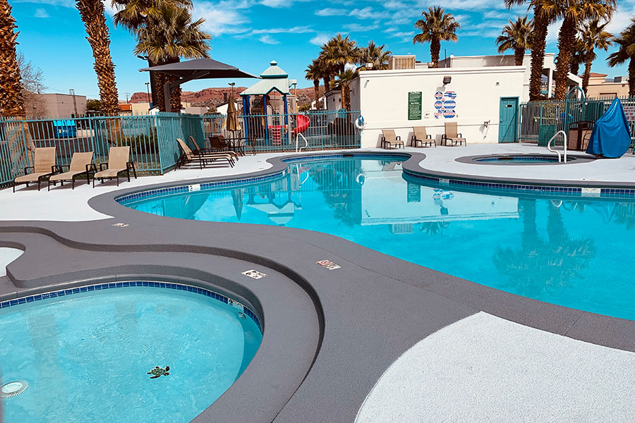 two outdoor pools and hot tub